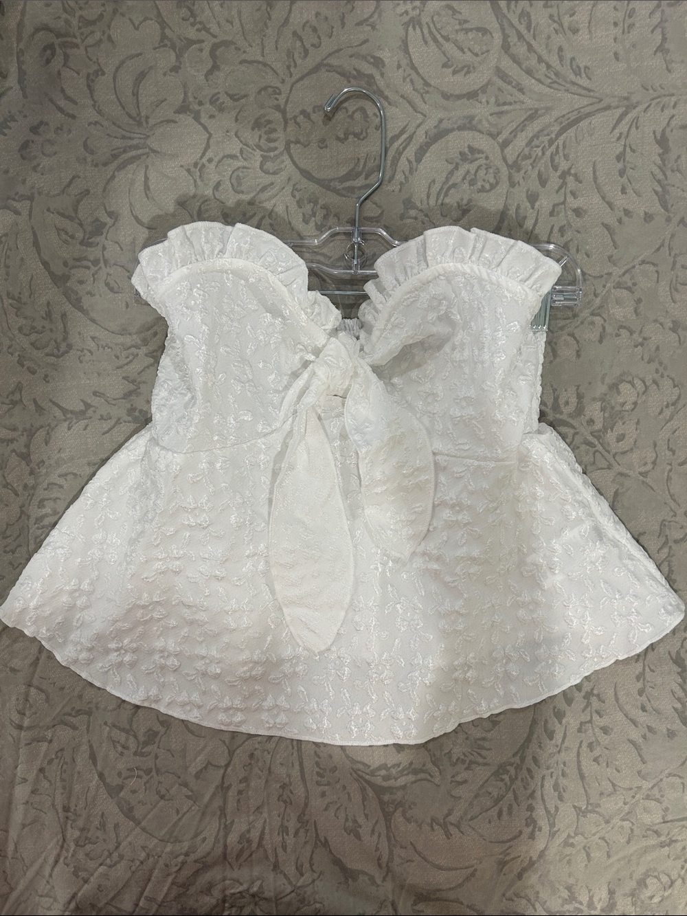 Trendy White Strapless Tie-Front Peplum Top